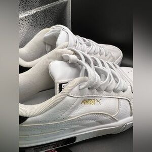 Puma Classic White Sneakers with Gold Accent size 5.5 US.